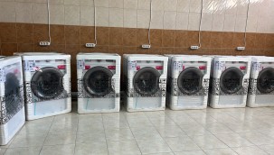 Kayseri Büyükşehir'den Konteyner Kent'e 20 çamaşır, 15 kurutma makinesi